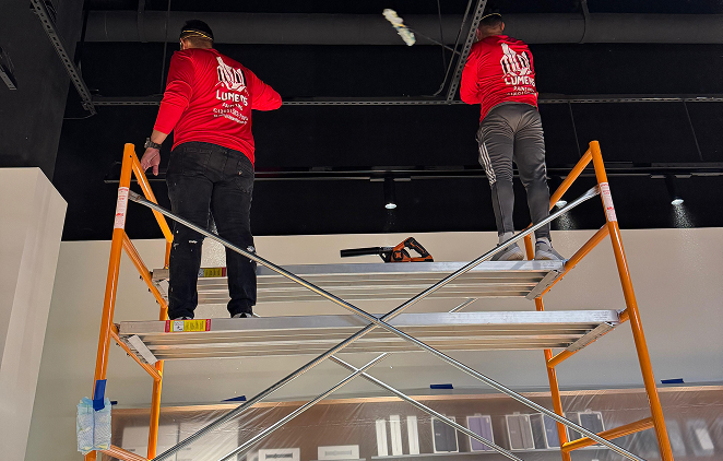 Commercial painter working inside a Miami-Dade, FL business - Commercial Painting Contractors