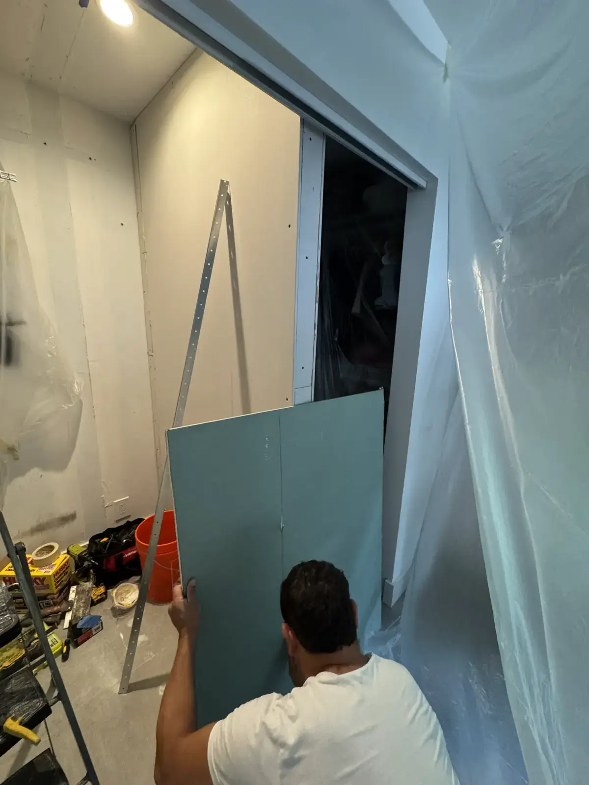 Closet Wall Demolition, Installation and Painting, handyman services project photo 24