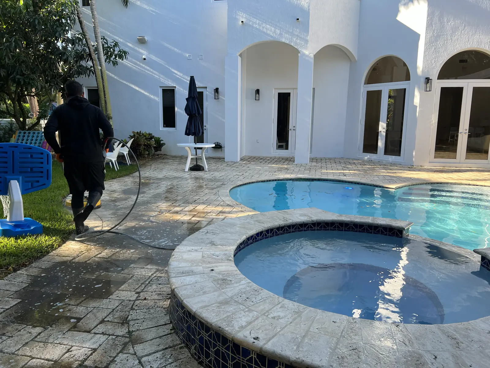 Pinecrest Driveway and Pool Deck Pressure Washing, pressure washing project photo 1