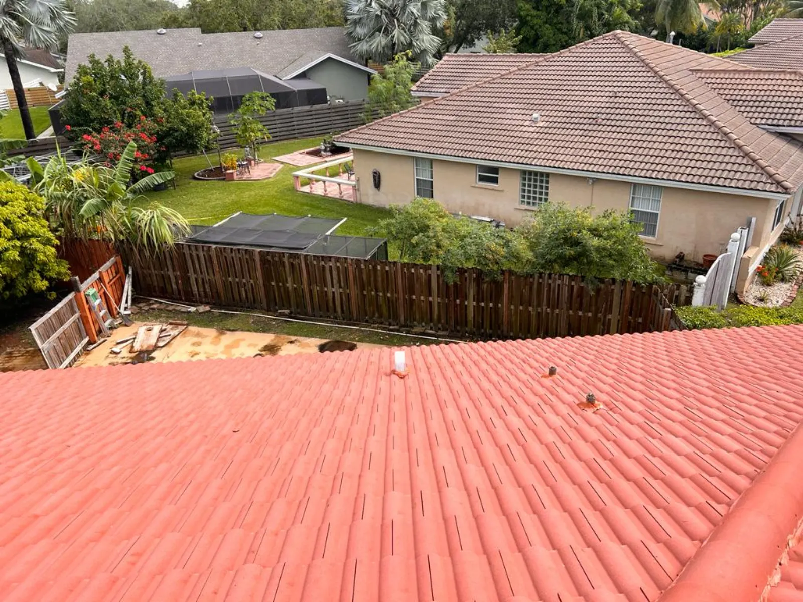 Driveway surface pressure cleaning with visible soil removal
