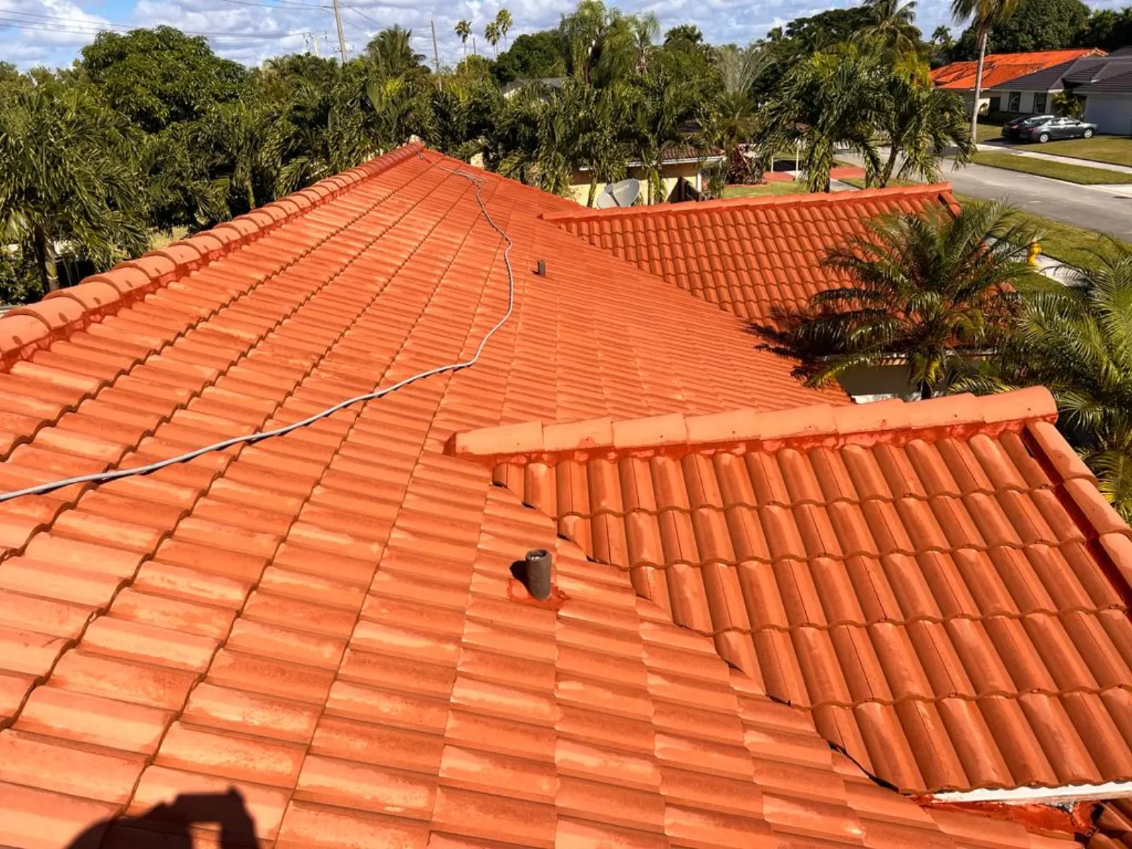 Residential roof pressure washing and surface cleaning project